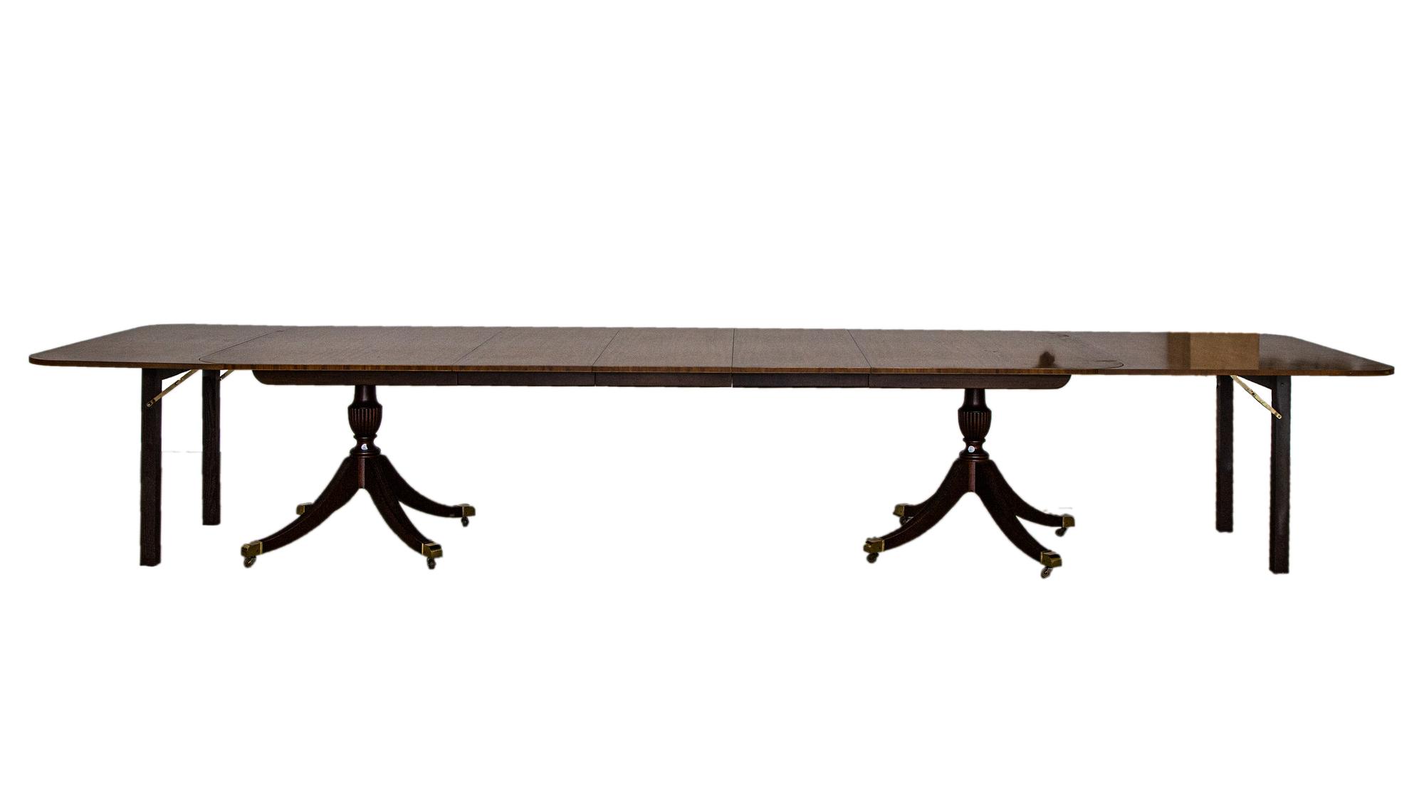 A George III Style Mahogany Double Pedestal Extension Dining Table