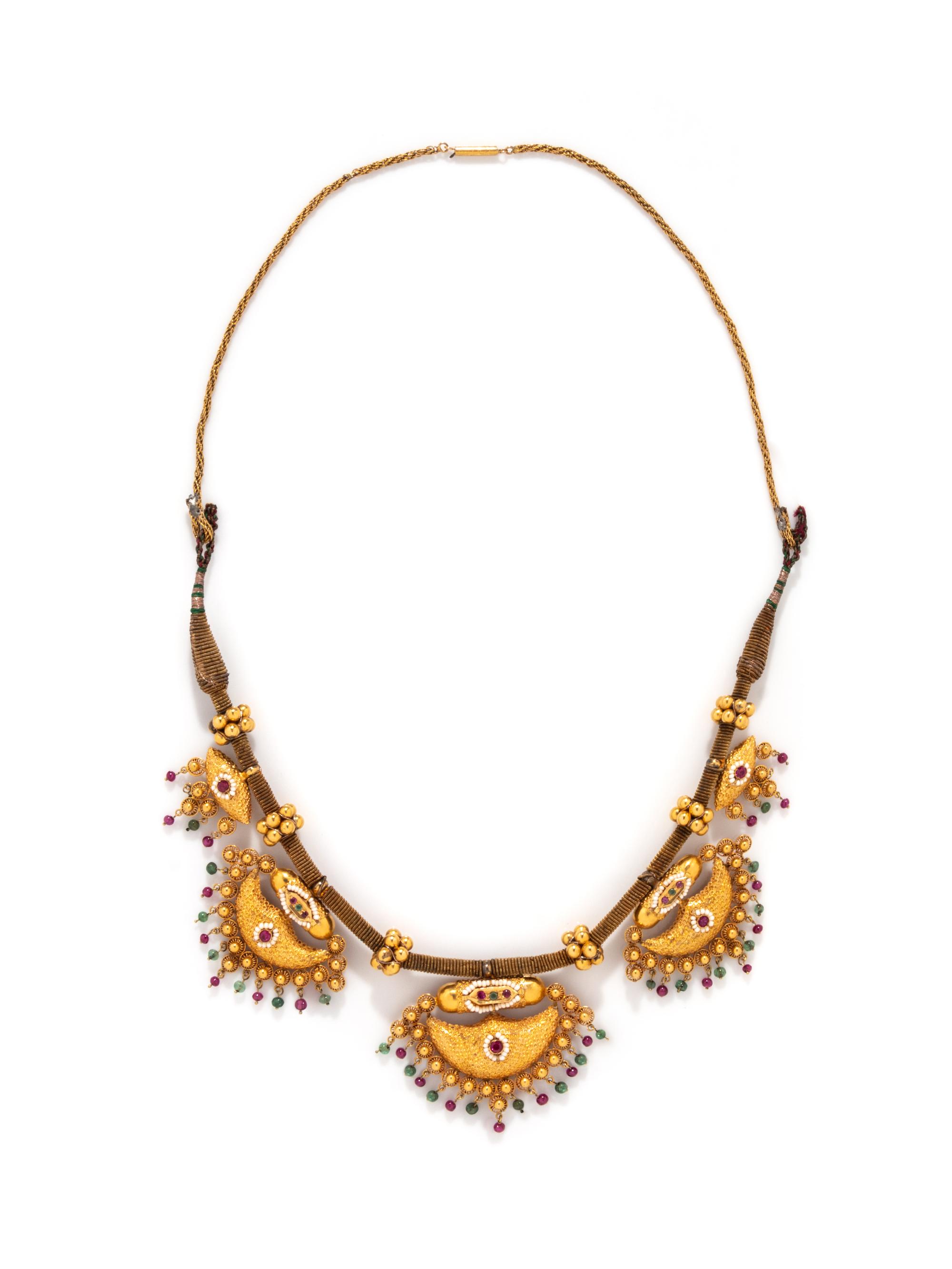INDIAN, YELLOW GOLD, EMERALD, AND SYNTHETIC RUBY NECKLACE
