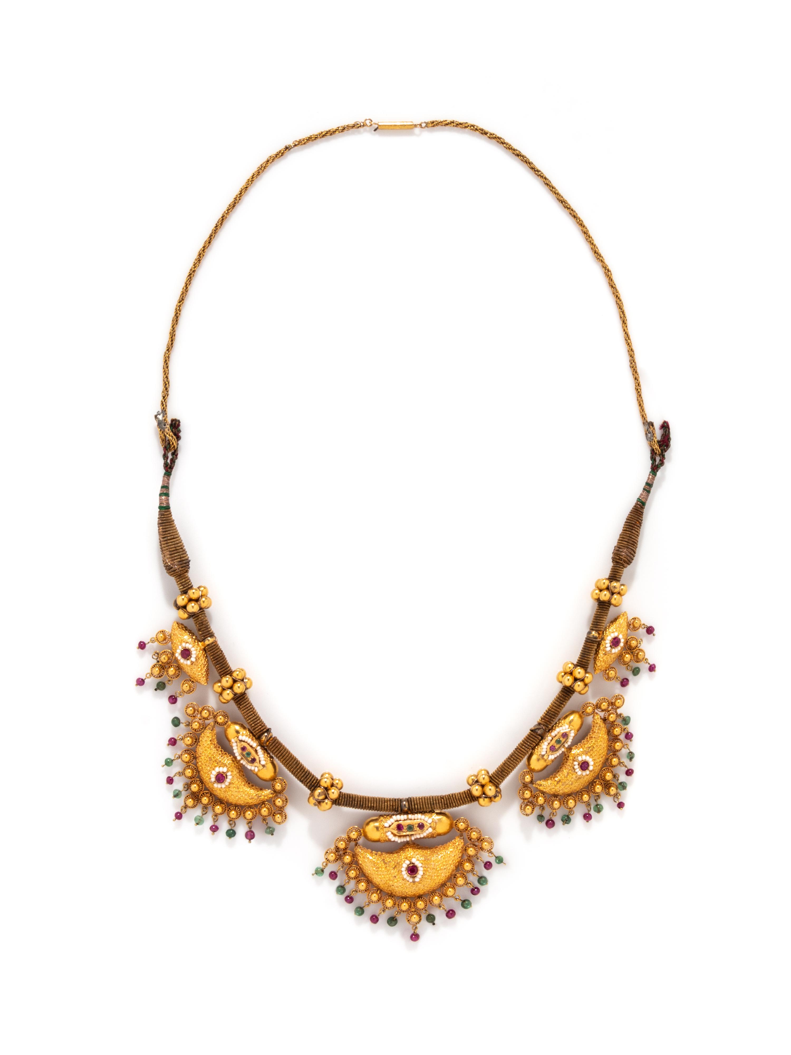 INDIAN, YELLOW GOLD, EMERALD, AND SYNTHETIC RUBY NECKLACE