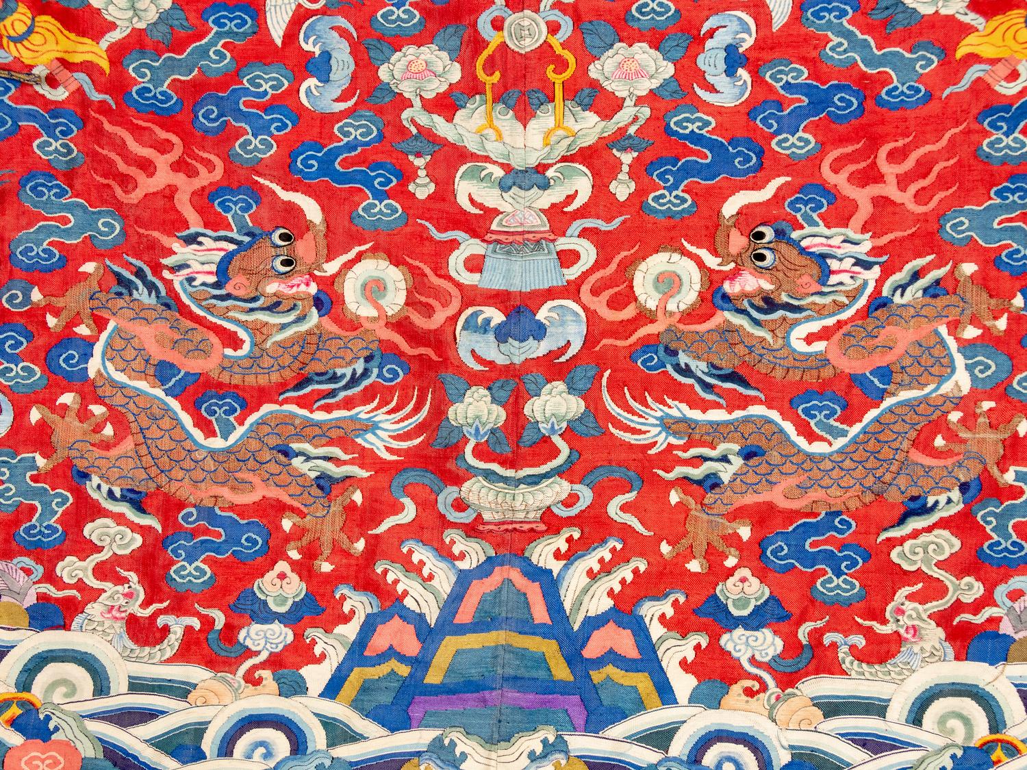 A Chinese Red Ground Kesi Silk Dragon Robe, Jifu, 19th Century 清晚期 紅地緙絲龍紋吉服