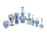 A Group of Eight Blue and White Earthenware Vases, Primarily Delft