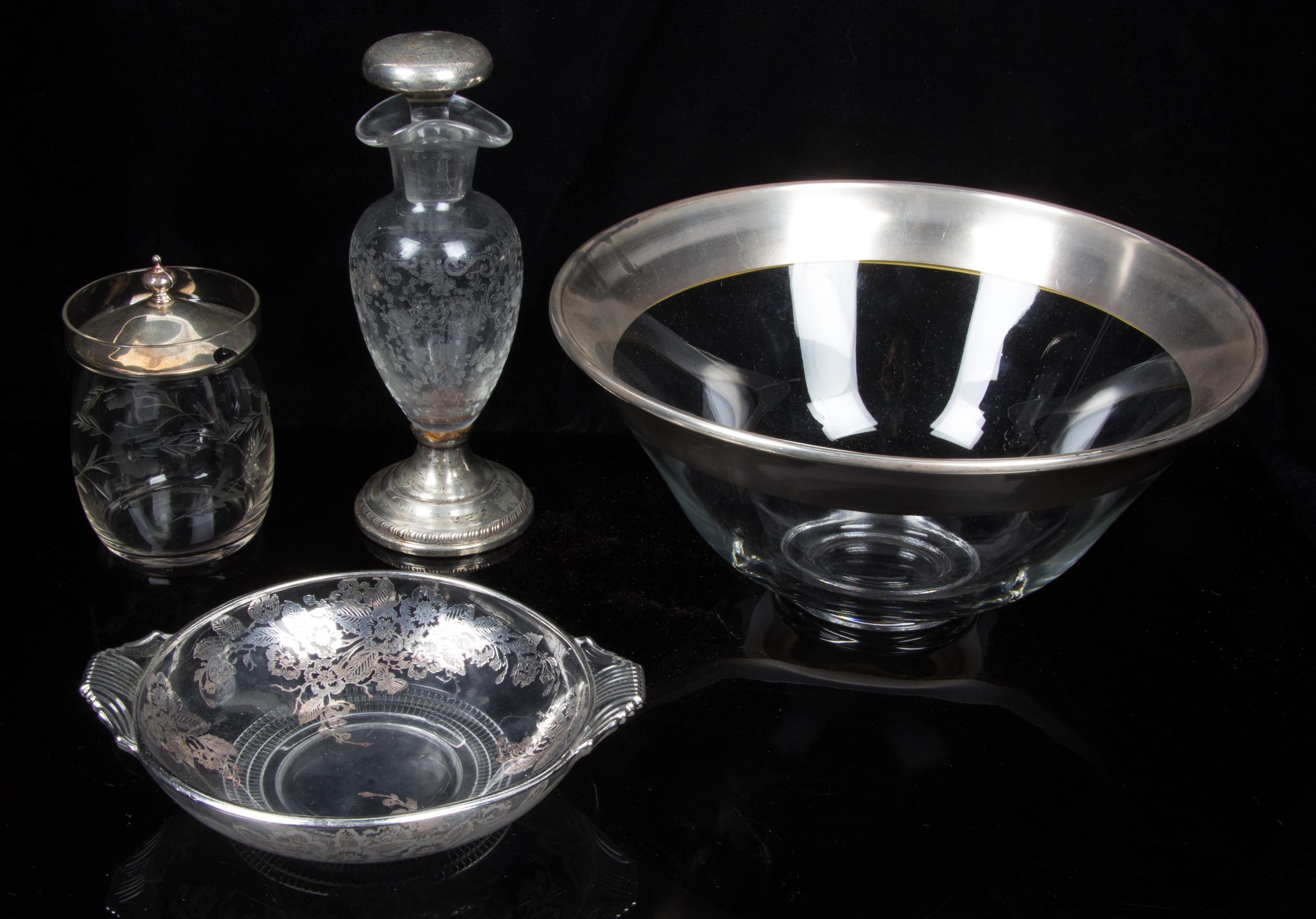 A Group of Silver-Plate Mounted Glass Table Articles Height of pitcher 11 3/8 inches.