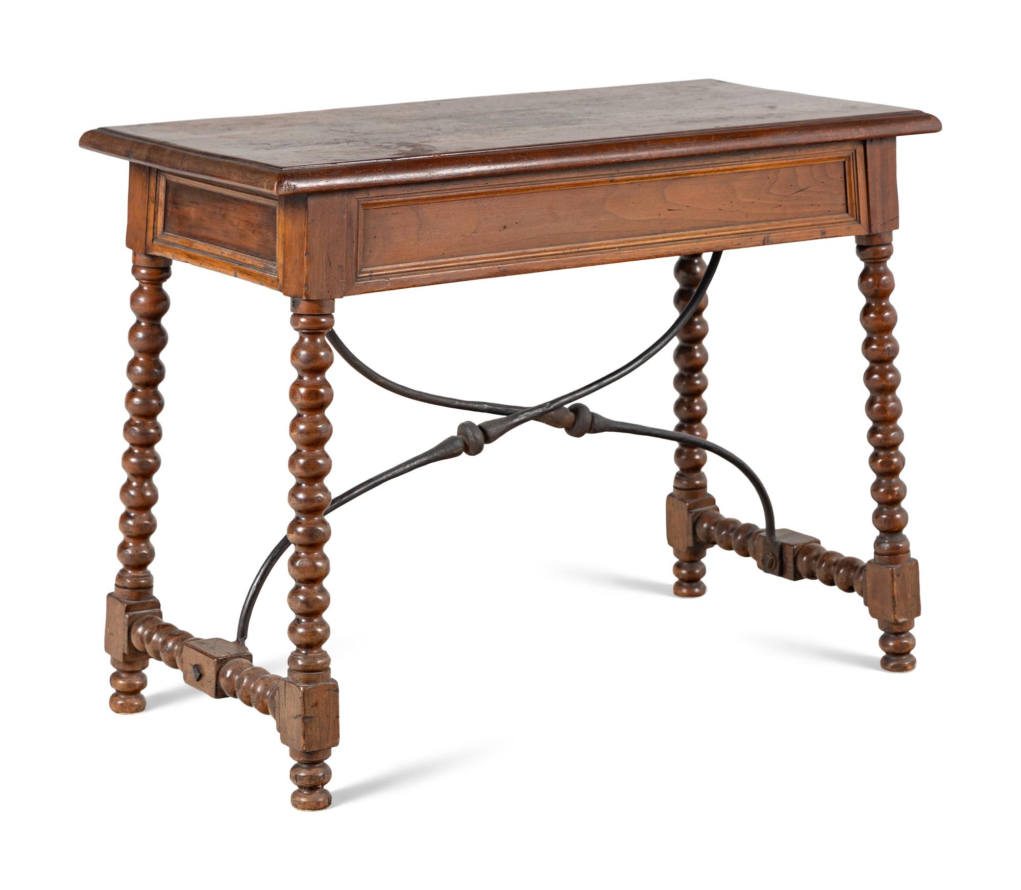 A Spanish Baroque Style Walnut Table