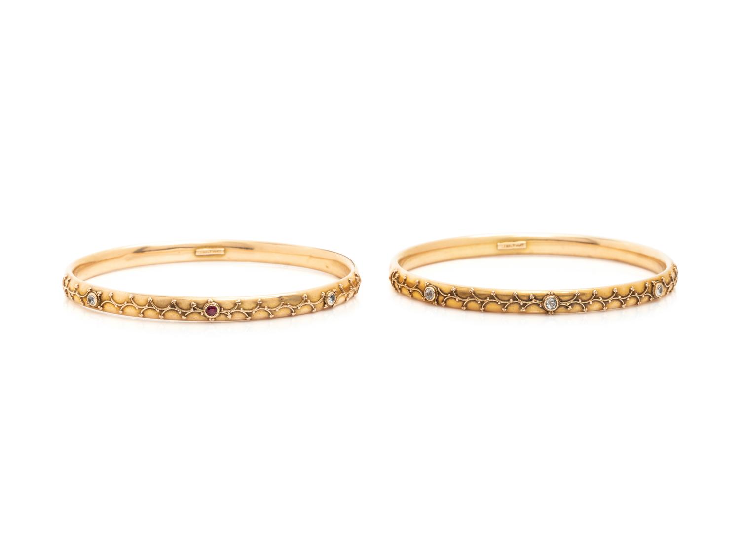 PAIR OF YELLOW GOLD AND DIAMOND BANGLE BRACELETS