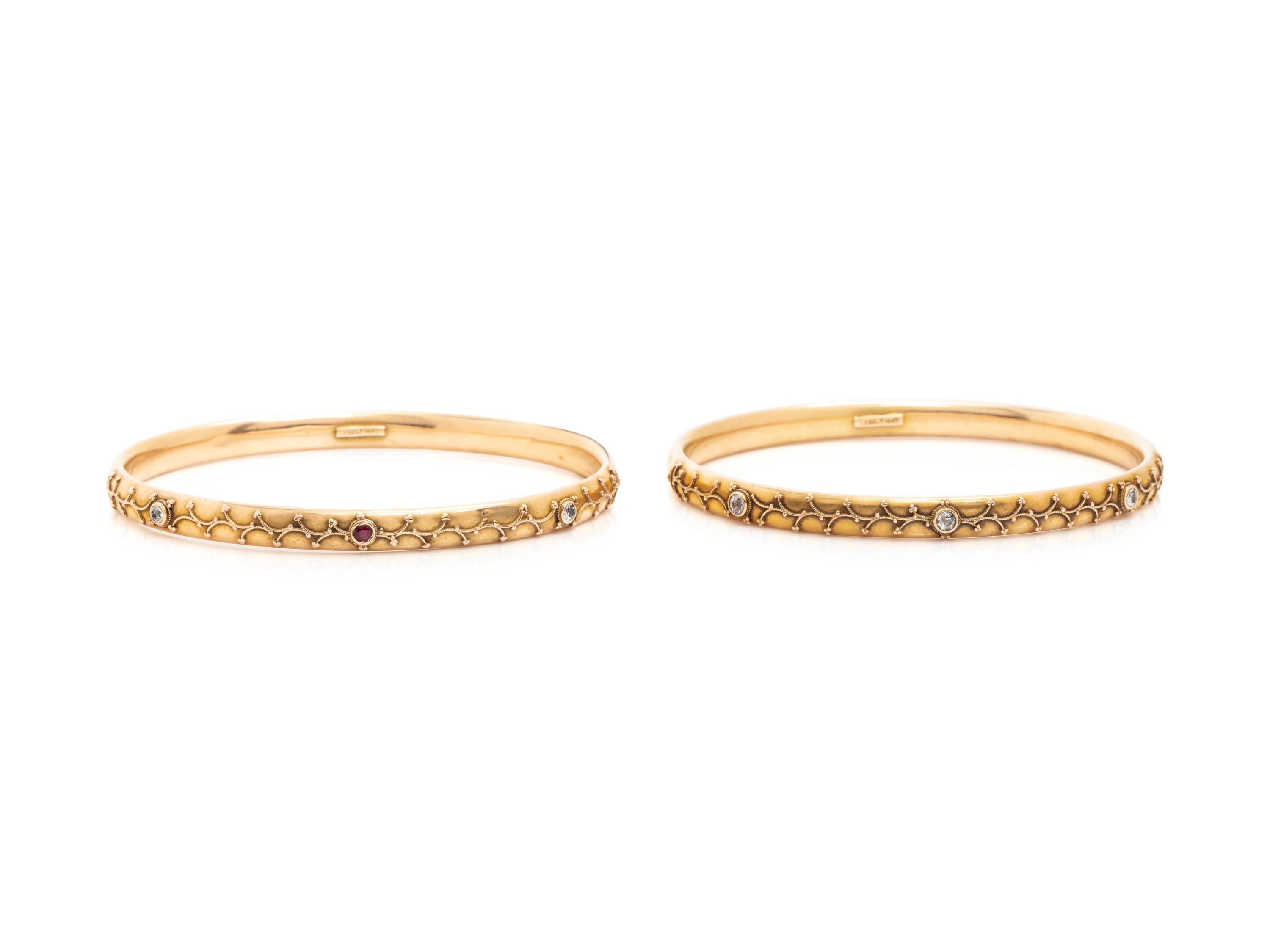 PAIR OF YELLOW GOLD AND DIAMOND BANGLE BRACELETS