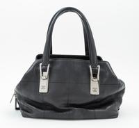 A Chanel Black Leather Handbag, 9.5" x 7" 5"; Handle drop: 5.5".