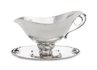 A Danish Silver Sauce Boat and Underplate, Georg Jensen Silversmithy, Copenhagen, First Half 20th Century, the boat marked with pattern