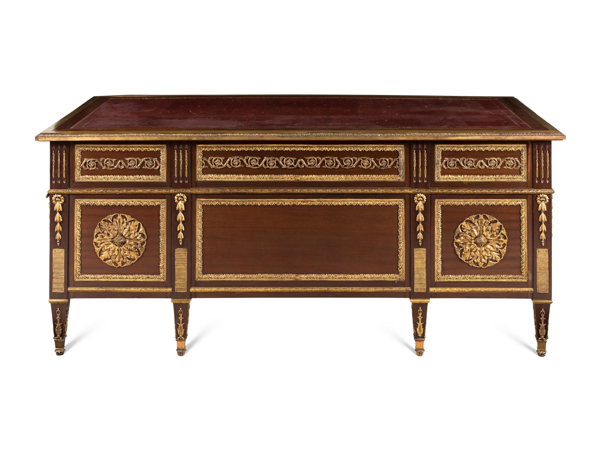 A Louis XVI Style Gilt Bronze Mounted Mahogany Bureau Plat
