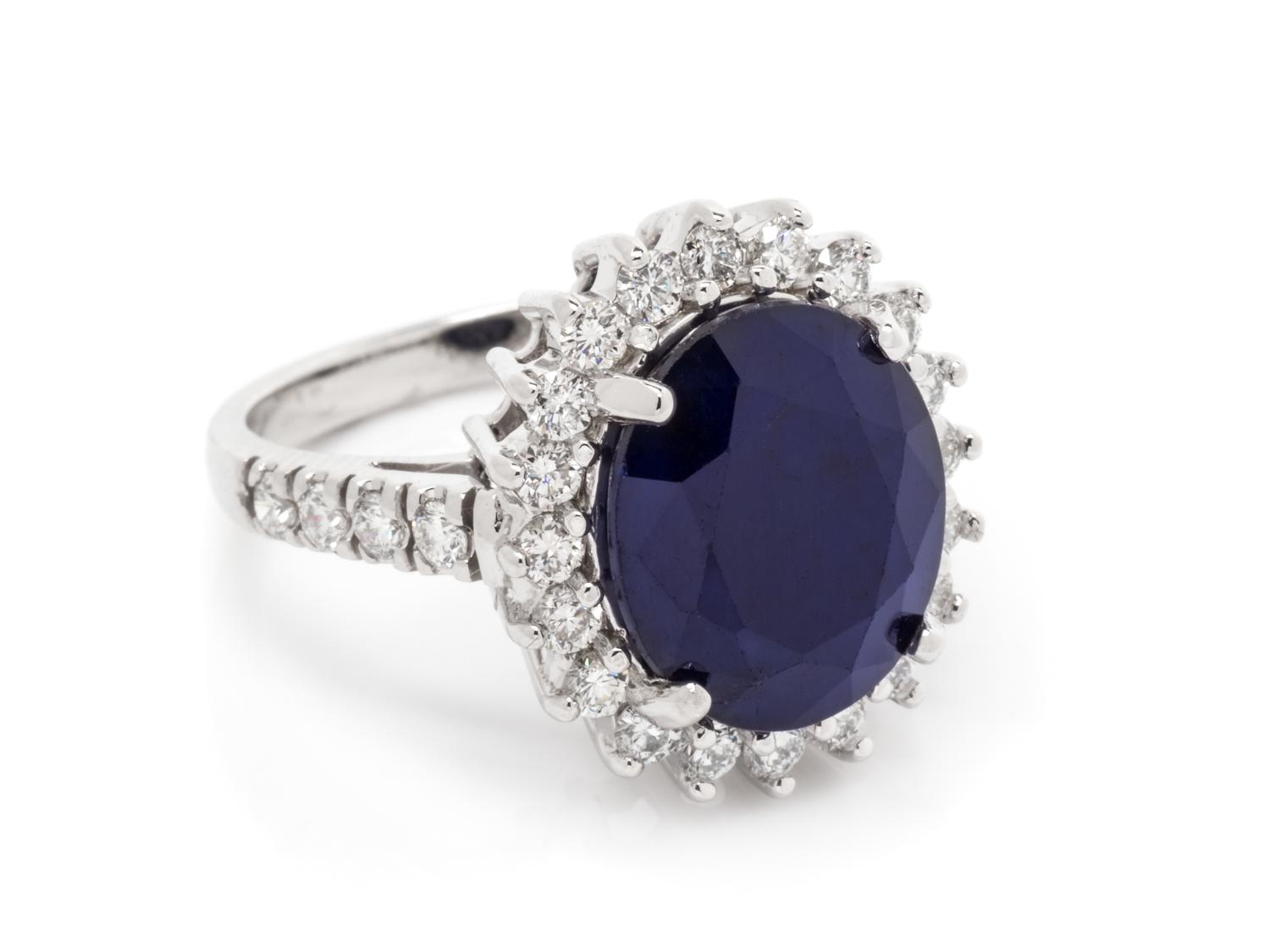 A 14 Karat White Gold, Sapphire and Diamond Ring,