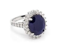 A 14 Karat White Gold, Sapphire and Diamond Ring,