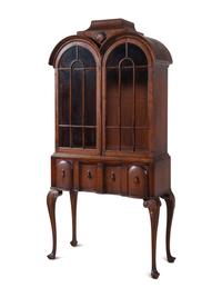A Pair of George II Style Mahogany Bookcases on Stands