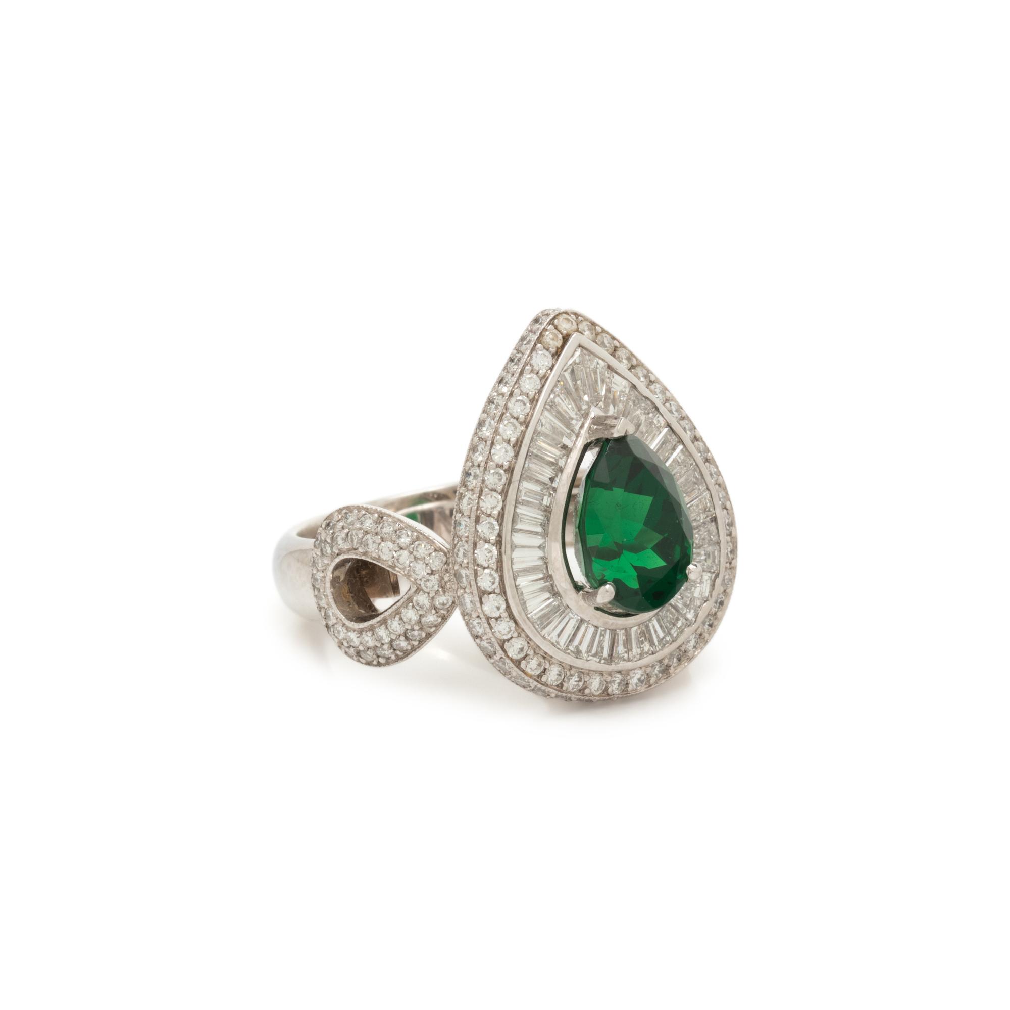TSAVORITE GARNET AND DIAMOND RING