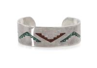 Two Navajo Bracelets Length of first 5 1/4 x opening 1 1/8 x width 2 1/8 inches.