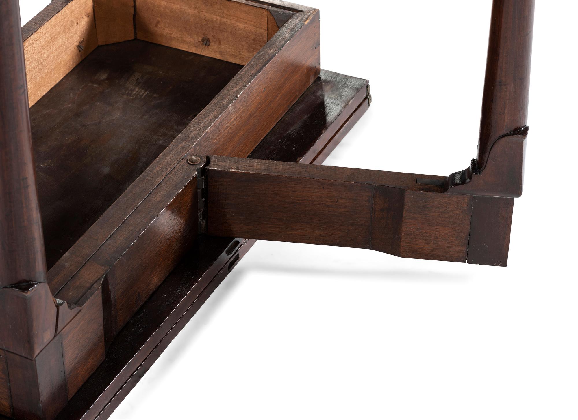 A George III Mahogany Games Table and a Set of Four Queen Anne Style Walnut Dining Chairs