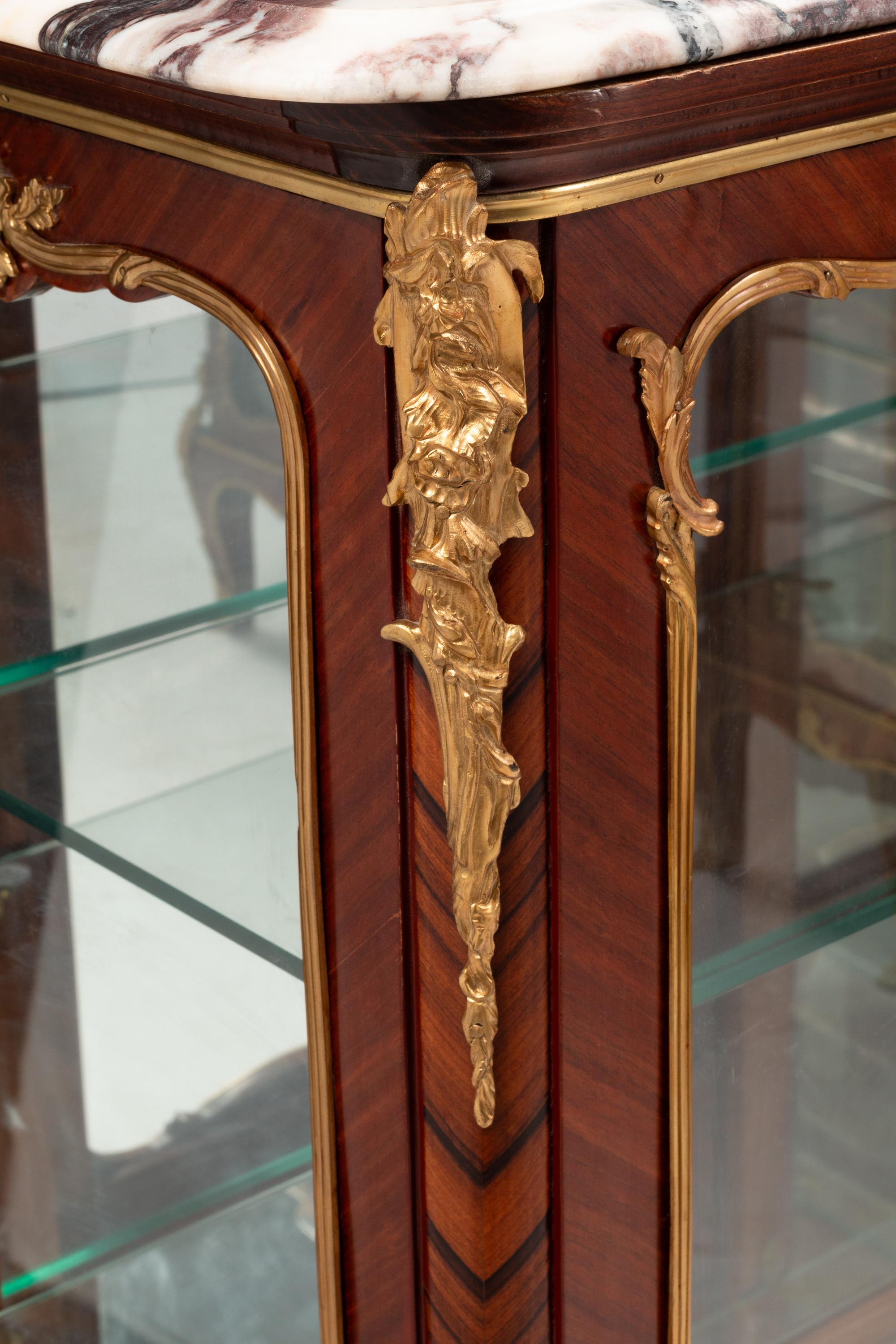 A Pair of Louis XV Style Gilt Bronze Mounted Kingwood Marble-Top Vitrine Cabinets
