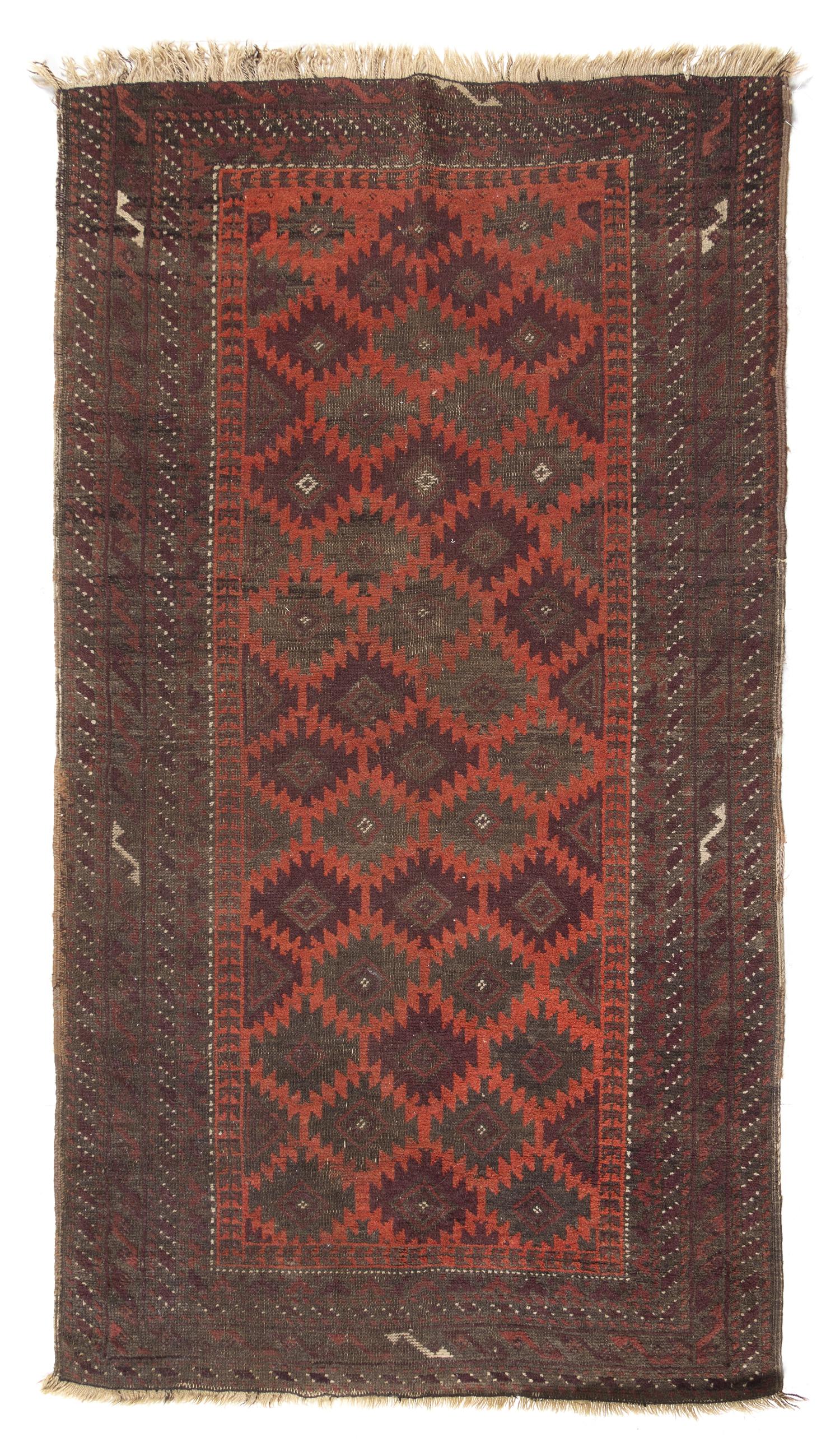 A Baluch Wool Rug 5 feet x 2 feet 9 inches. — LATE 19TH/EARLY 20TH CENTURY