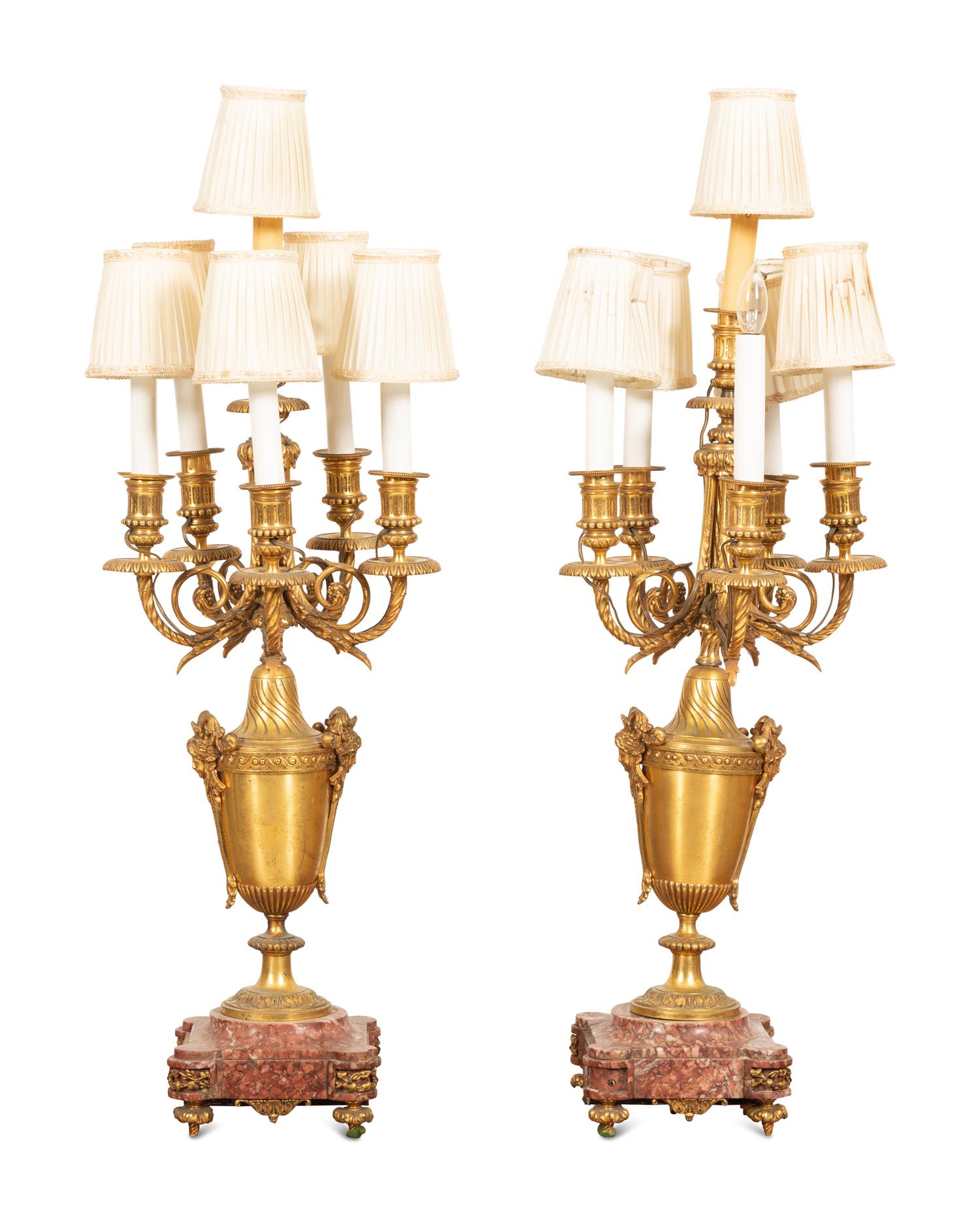 A Pair of Empire Style Six-Light Bronze Urn-form Candelabra