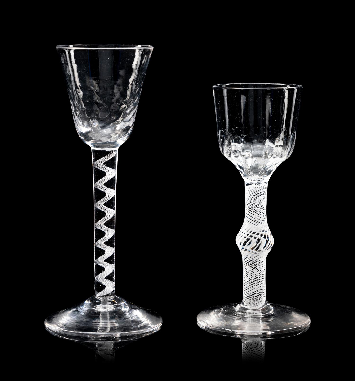 Two Moulded Glass Wine Glasses