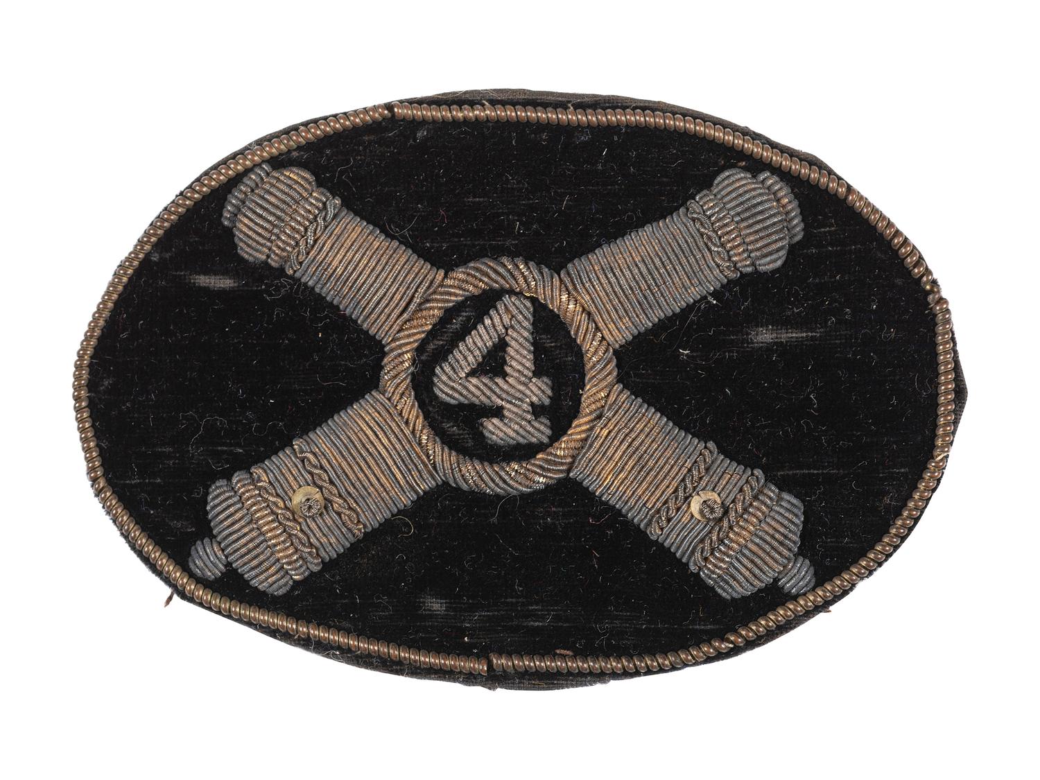 Civil War artillery hat insignia with regimental number "4."