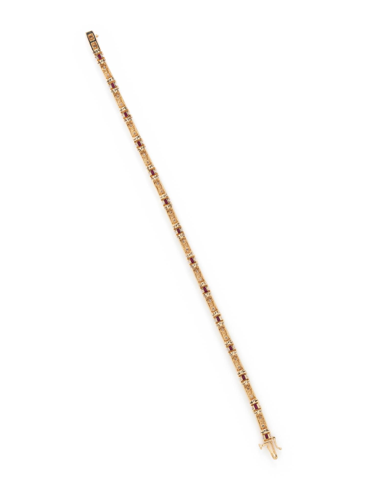 YELLOW GOLD, SYNTHETIC RUBY, AND DIAMOND BRACELET