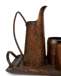 An Arts & Crafts Style Hand Hammered Copper Tray, Pitcher, and Six Mugs — 20TH CENTURY