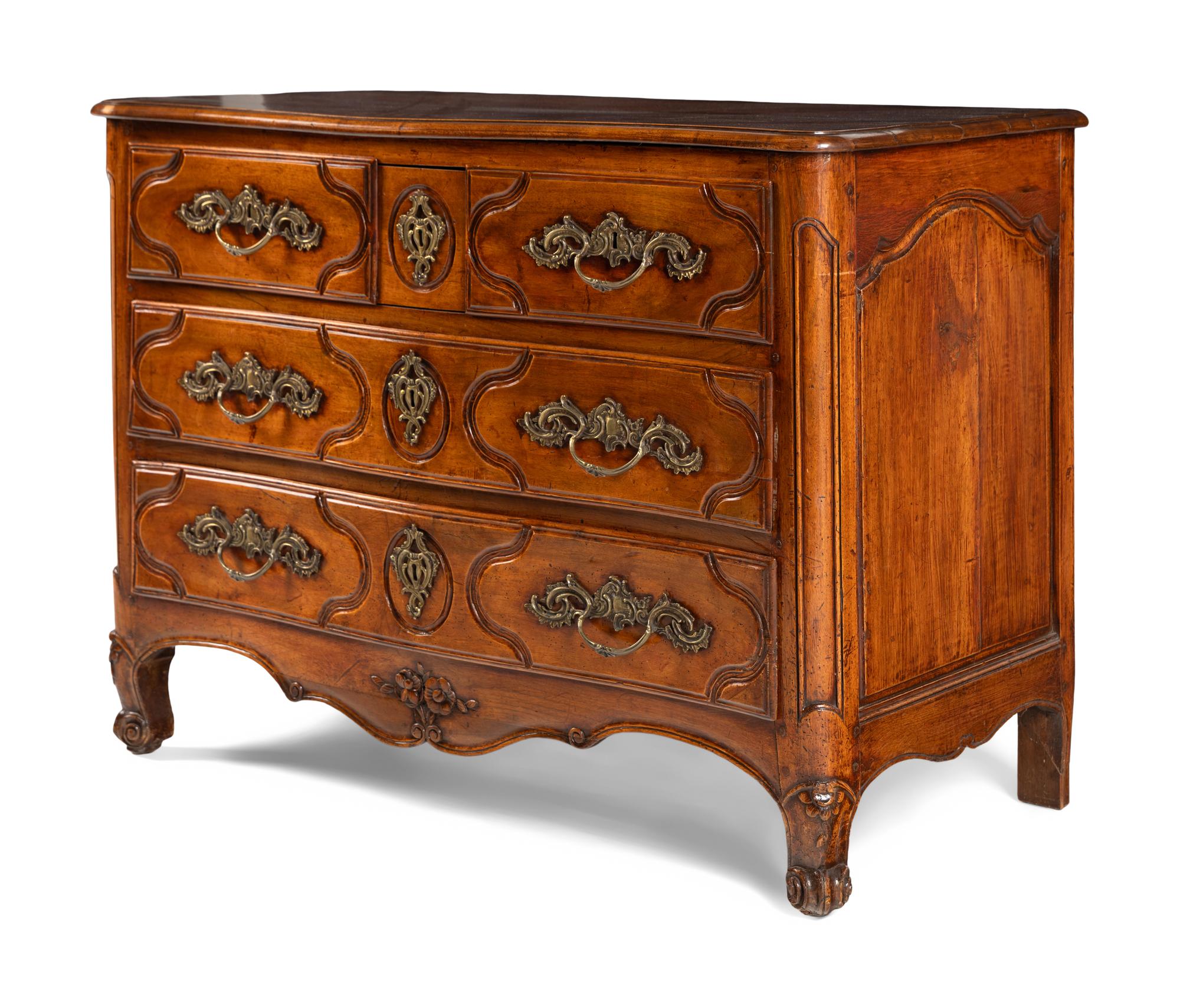 A Louis XV Provincial Walnut Commode