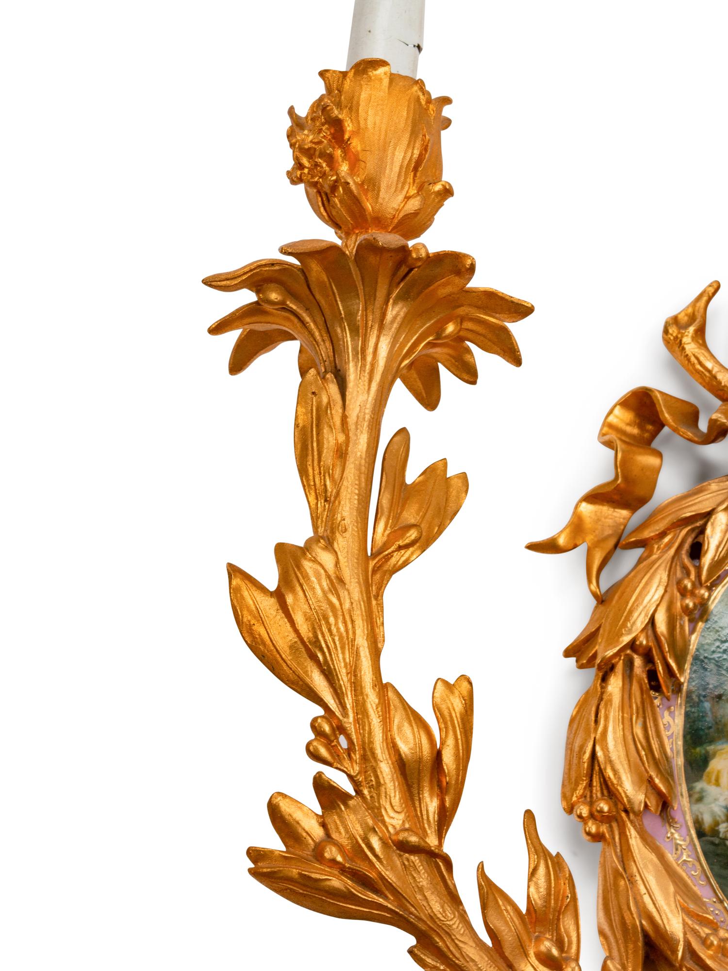 A Pair of Louis XVI Style Porcelain-Mounted Gilt-Bronze Four-Light Sconces