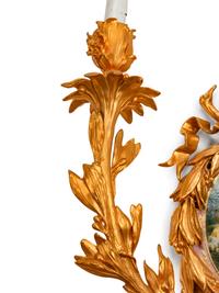 A Pair of Louis XVI Style Porcelain-Mounted Gilt-Bronze Four-Light Sconces
