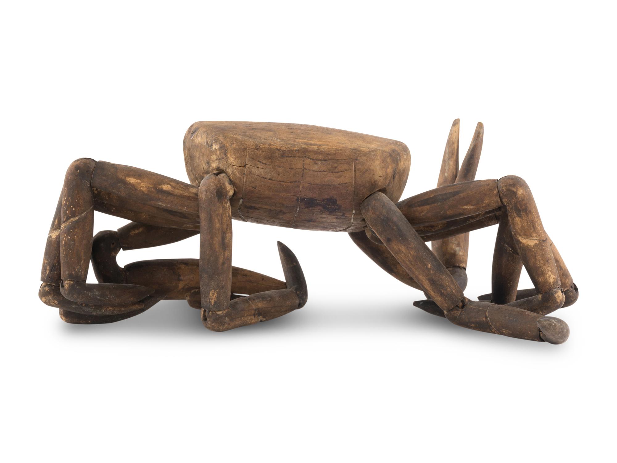 A Carved and Articulated Wood Crab Figure