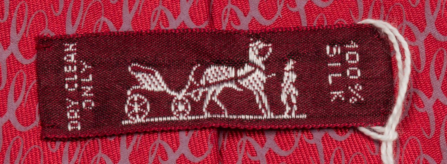A Group of Three Hermes Silk Ties, 3.15" wide.