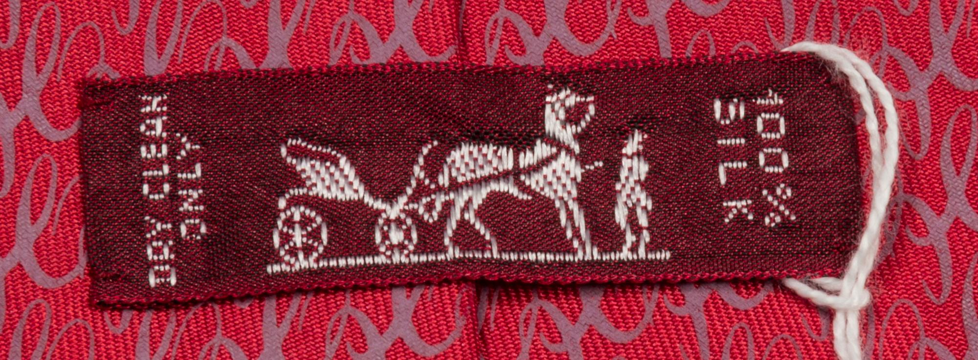 A Group of Three Hermes Silk Ties, 3.15" wide.