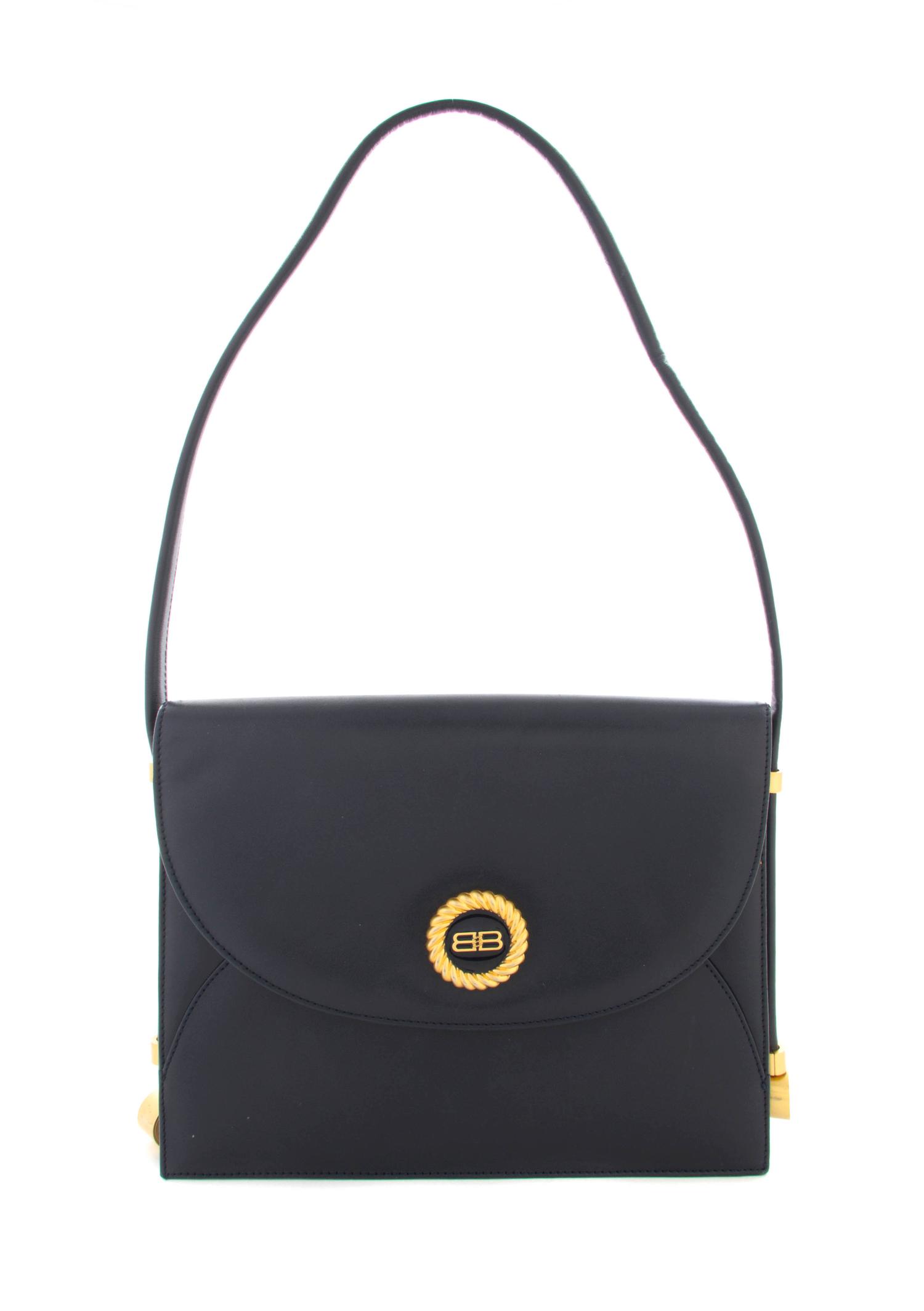A Balenciaga Black Leather Bag, 11 x 9 x 2 1/2 inches.