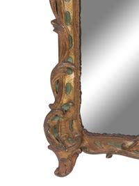 A Régence Carved and Painted Giltwood Mirror