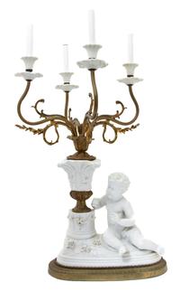 A Continental Bisque Mounted Gilt Bronze Four-Light Candelabrum Height to bulb 29 x width 14 x depth 14 inches. — LATE 19TH/EARLY 20TH CENTURY