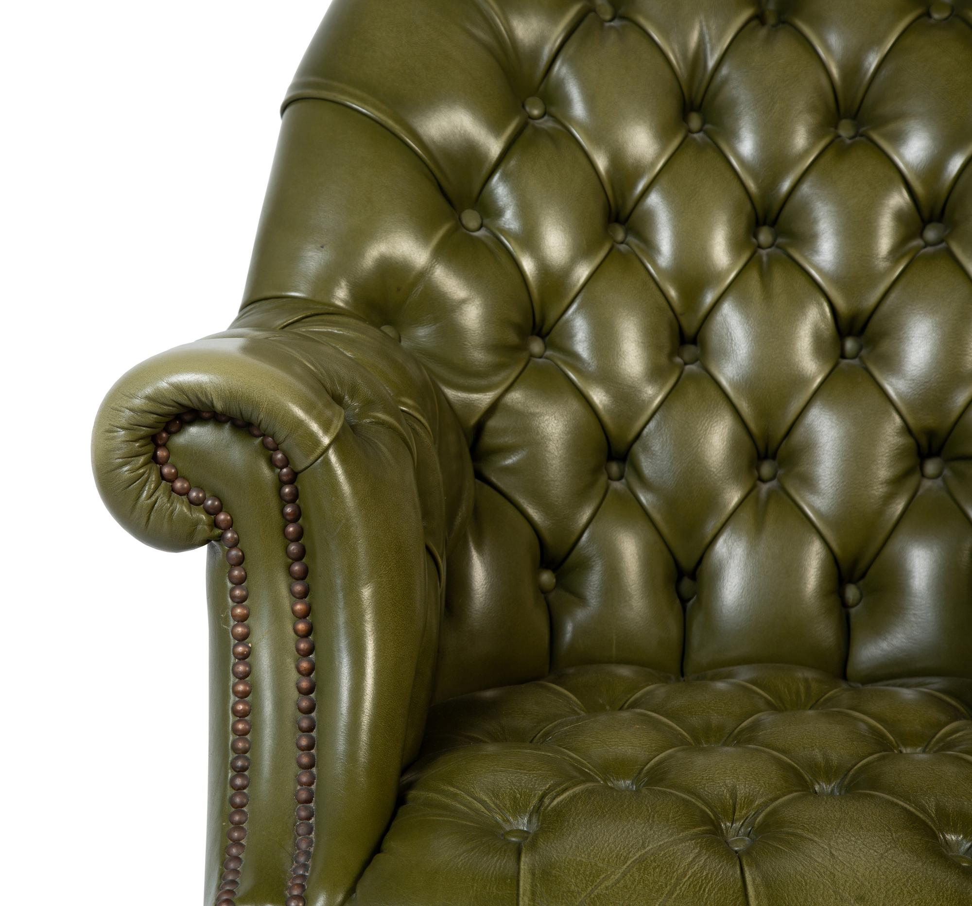 A Pair of English Button-Tufted Leather Swivel Chairs — SHEPARD, 20TH CENTURY