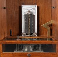 A Polyphon Mikado 24 1/2 Inch Upright Disk Music Box