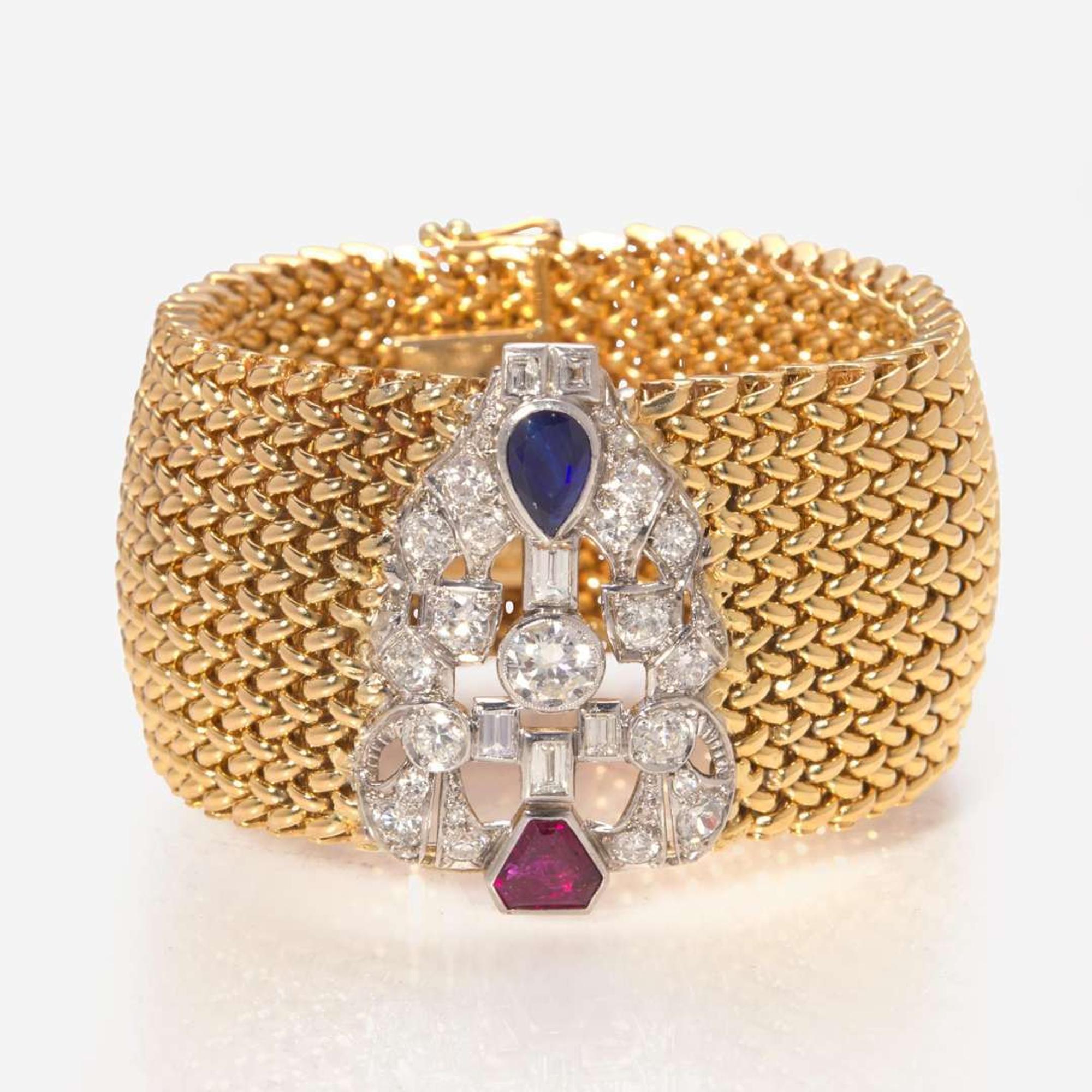 An 18K Yellow Gold, Platinum, and Gemstone Bracelet