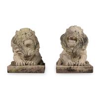A Pair of Carved Granite Lions