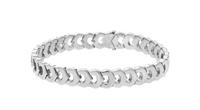 An 18 Karat White Gold Signature Demi Parure, Cartier, 81.00 dwts.