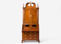 A Chippendale Carved Cherrywood Desk and Bookcase