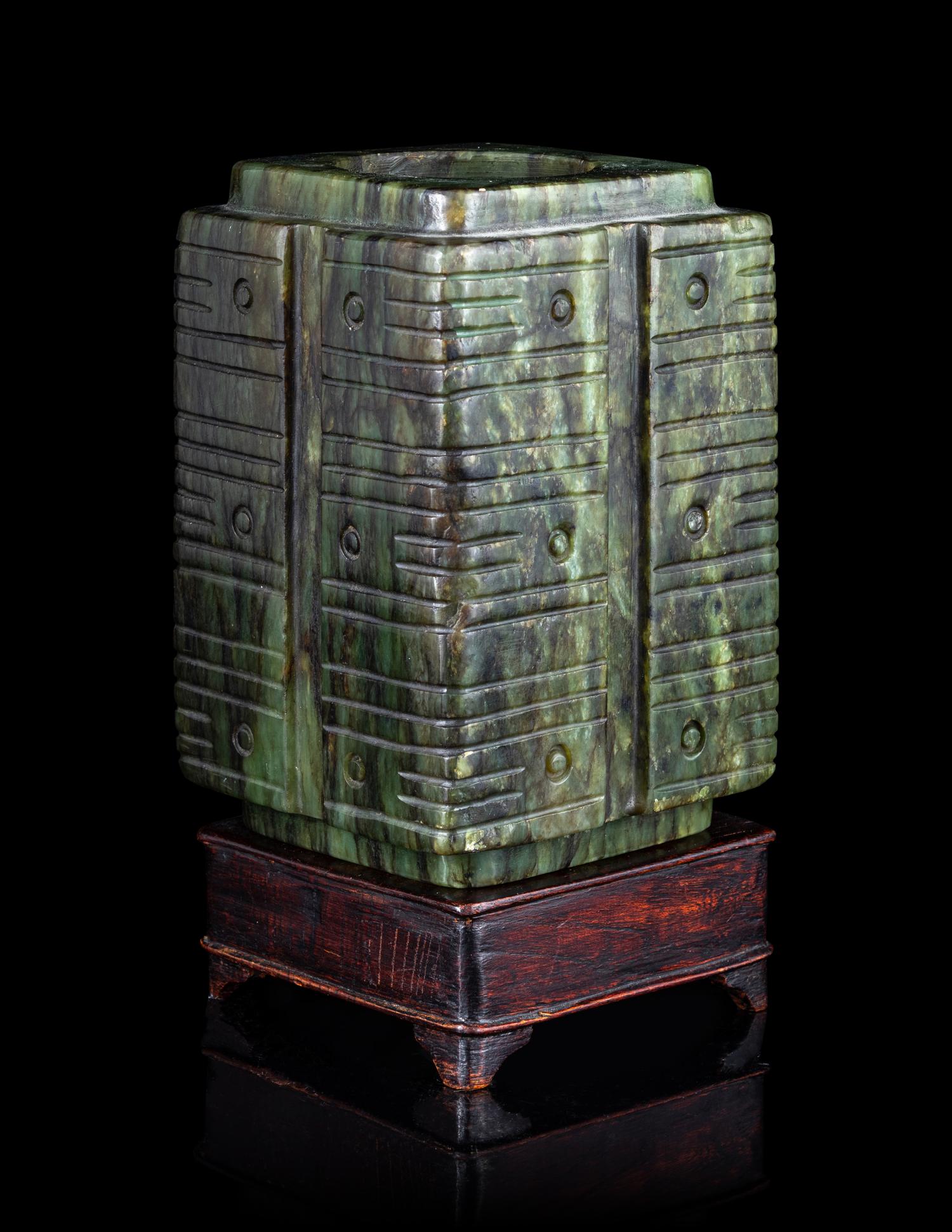 A Chinese Carved Green Jade Cong