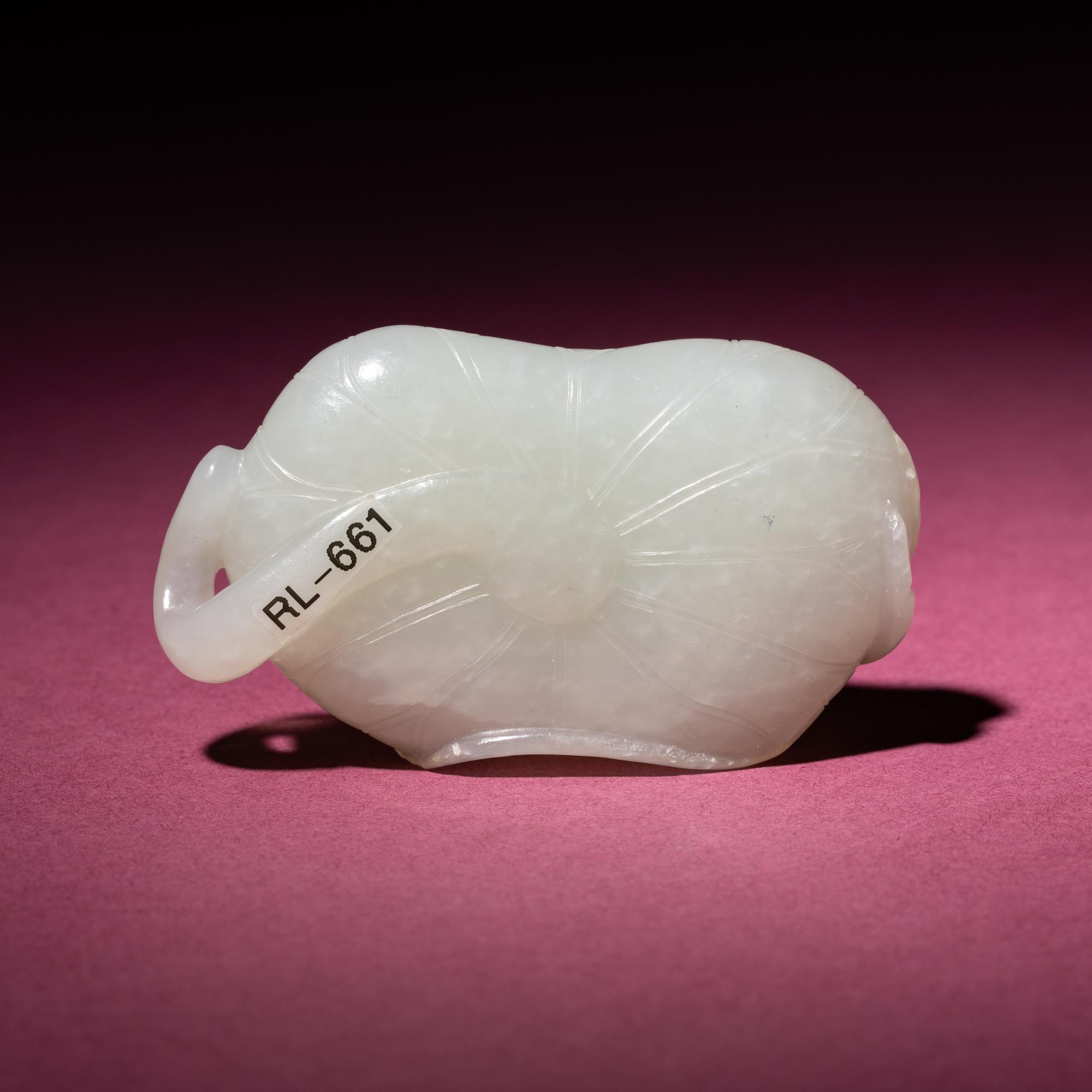 A Chinese White Jade Carving of a Crab on Lotus Leaf, 18th/19th Century — 清中期 白玉蓮葉螃蟹把件