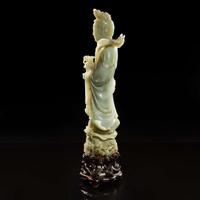 A large Chinese carved celadon jade figure of a bodhisattva 青玉雕觀音 Late Qing to Republic period ?????