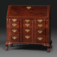 A Chippendale Figured Mahogany Block-Front Claw-and-Ball Foot Slant-Front Desk