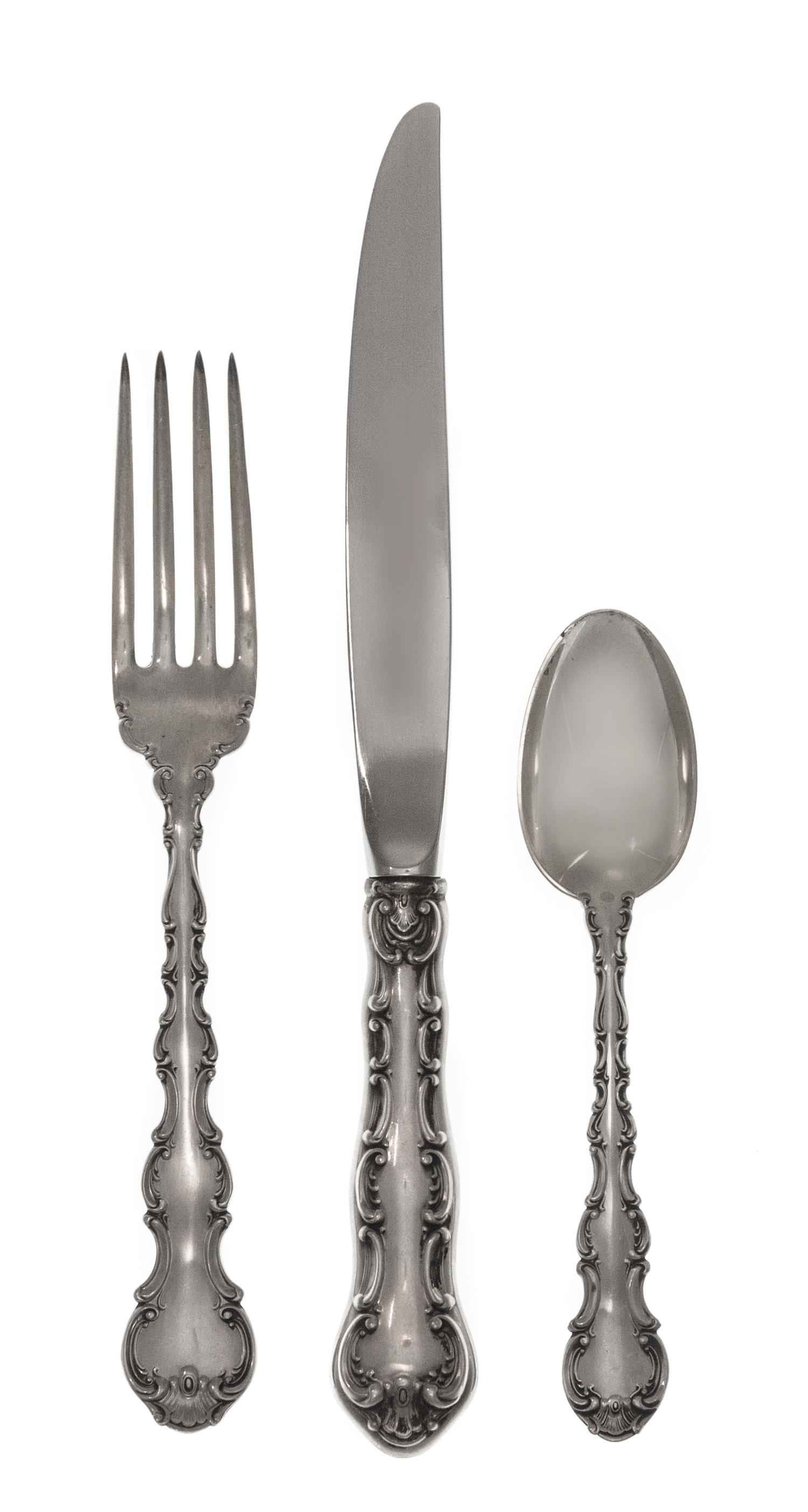 An American Silver Flatware Service, Gorham Mfg. Co., Providence, RI, Strasbourg pattern, comprising: 8 dinner knives 8 dinner forks 16