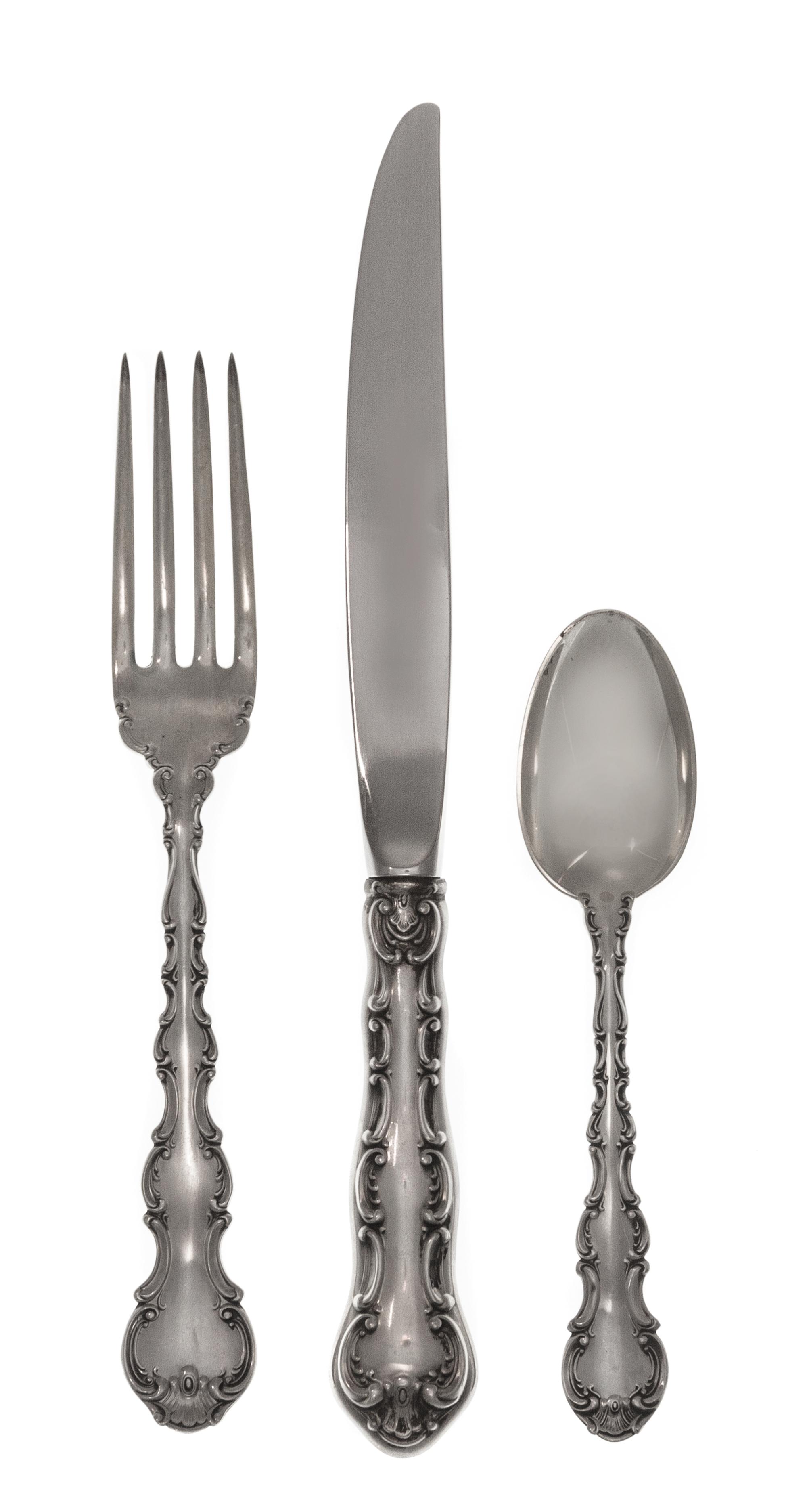 An American Silver Flatware Service, Gorham Mfg. Co., Providence, RI, Strasbourg pattern, comprising: 8 dinner knives 8 dinner forks 16