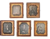 35 sixth plate daguerreotypes featuring women of varying ages.