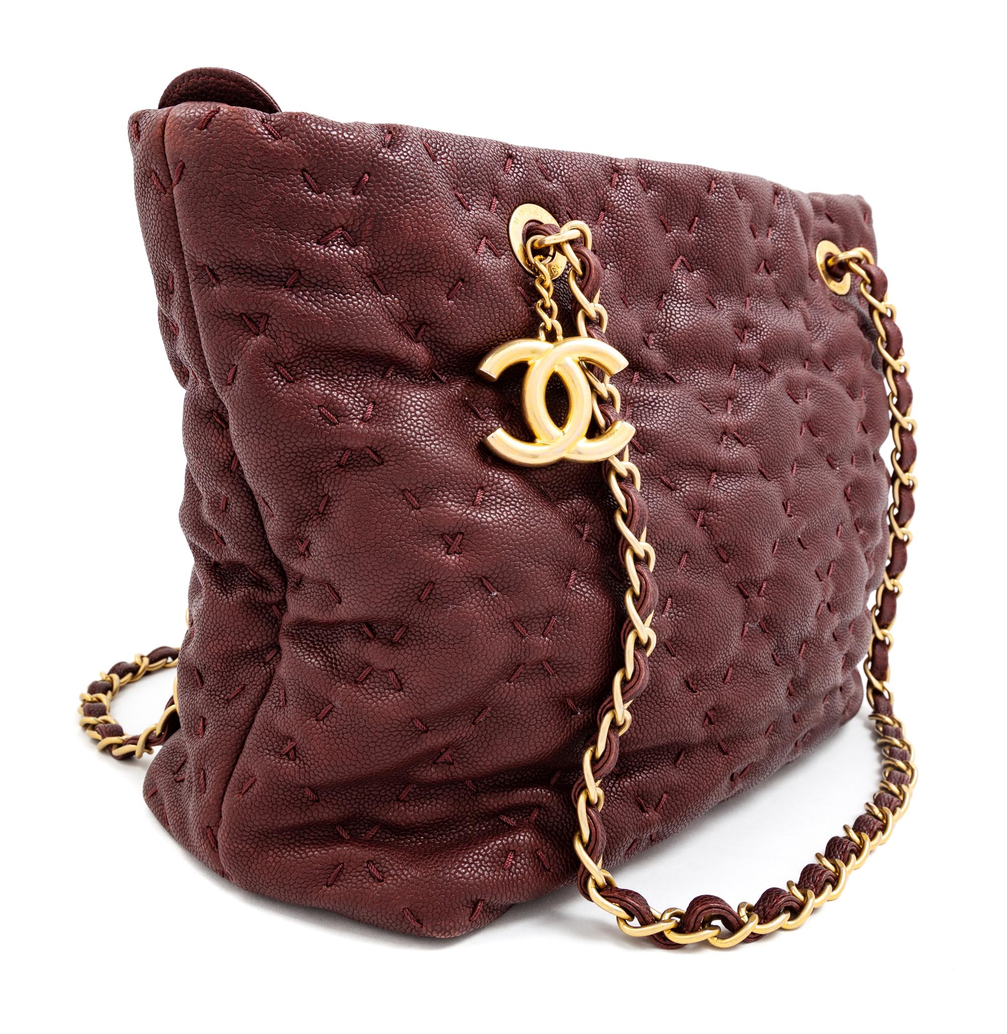 A Chanel Burgundy Caviar Quilted Wild Stitch Tote, 10.5" H x 12.5" W x 5" D; Strap drop: