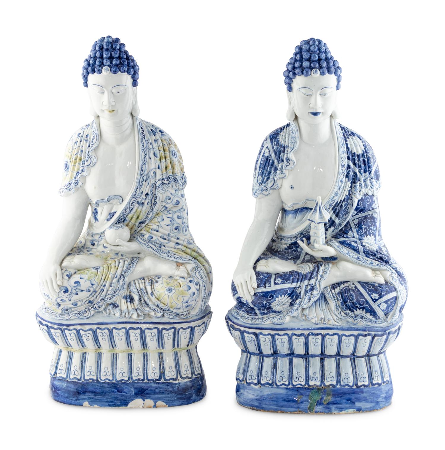 Two Blue and White Glazed Seated Figures