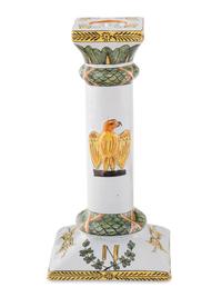 A Set of Four French Faience Candlesticks
